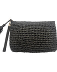 Black woven raffia clutch bag with a tassel on a white background