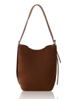 Brown suede shoulder handbag on a white background.