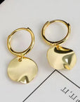 Gold hoop earrings with textured disk pendants