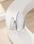 sliver chunky adjustable ring on a white surface