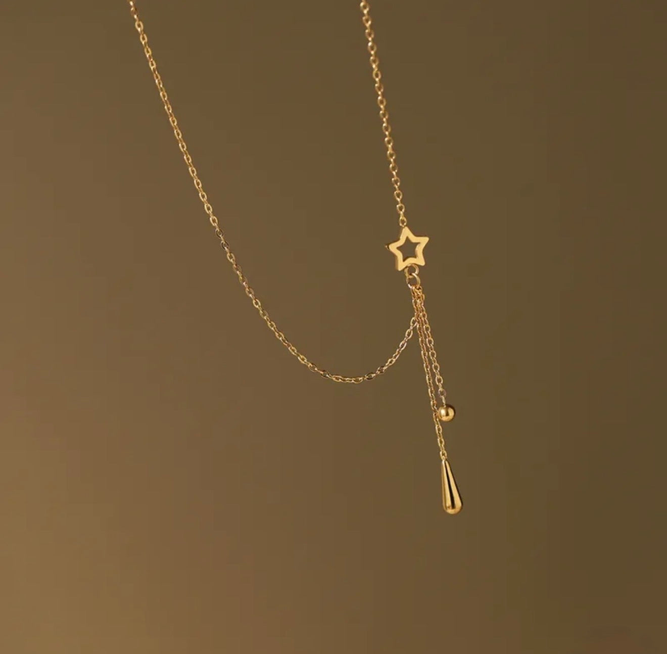 Gold Delicate Star Drop Necklace