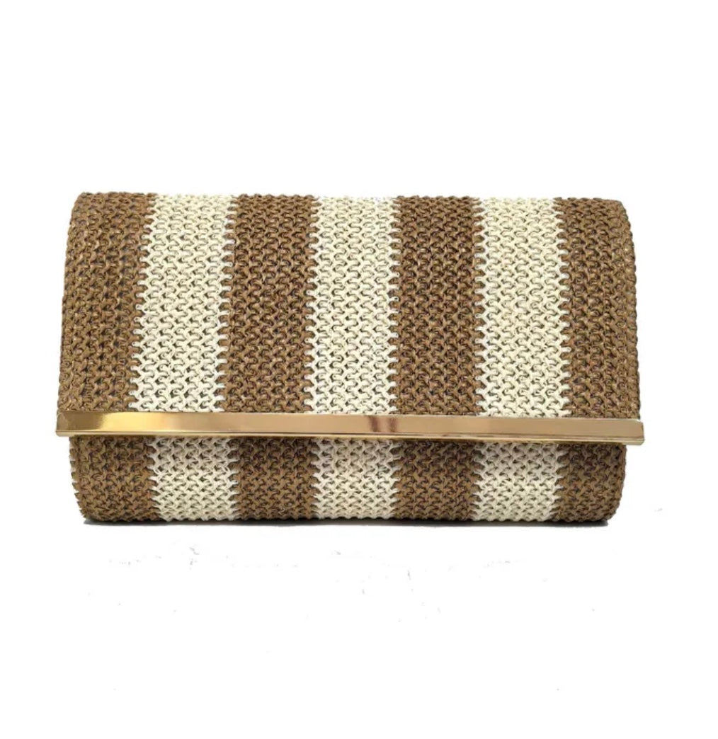 Striped clutch bag with gold trim on a white background