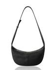 Black crossbody wide strap handbag on a white background.