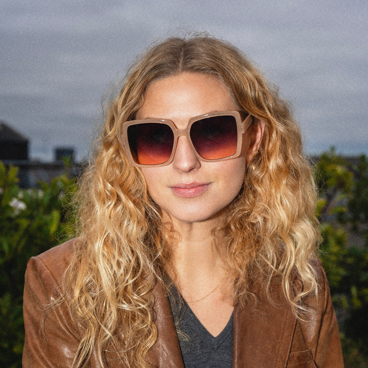 image of woman wearing square framed sunglasses 
