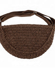 Brown woven raffia crossbody bag on a white background