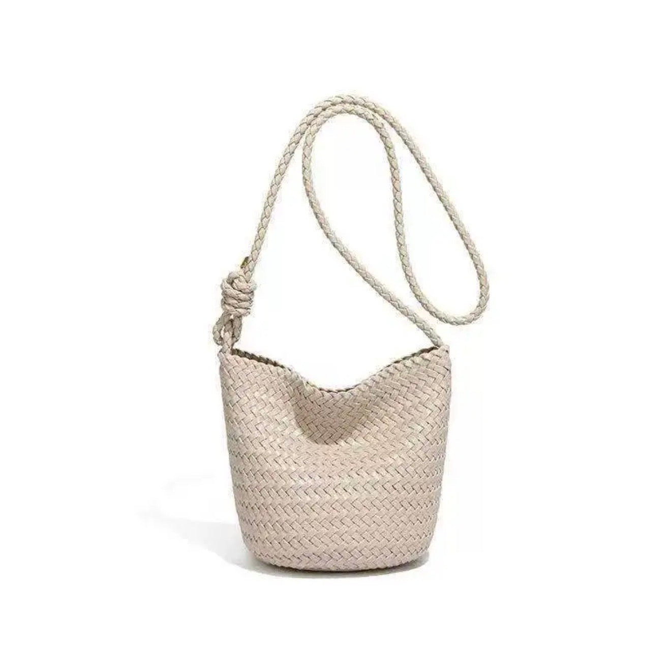Woven handbag with a rope handle on a white background