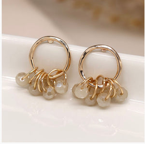 GOLD HOOP EARRINGS WITH WHITE CRYSTAL BEADS