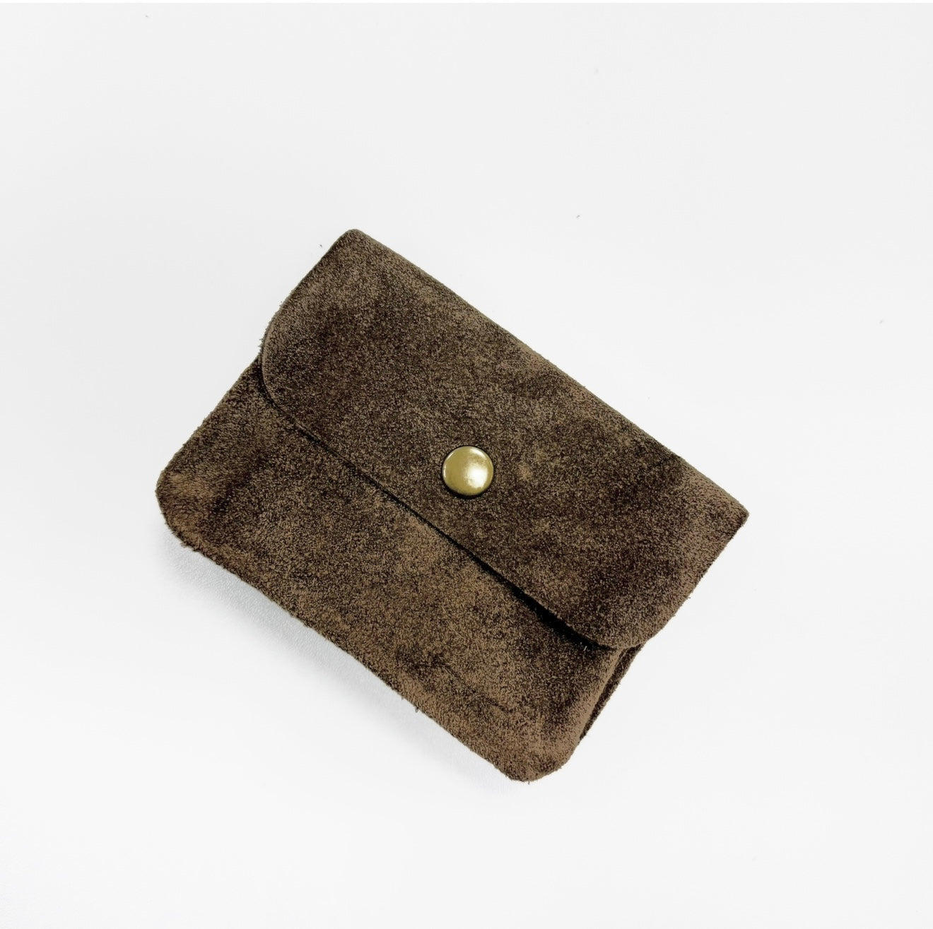 Dark taupe suede wallet with a gold button. 