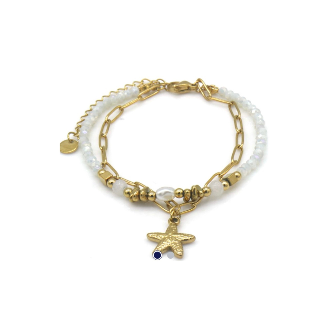 Beaded double layer bracelet with starfish charm and white beads on a white background.