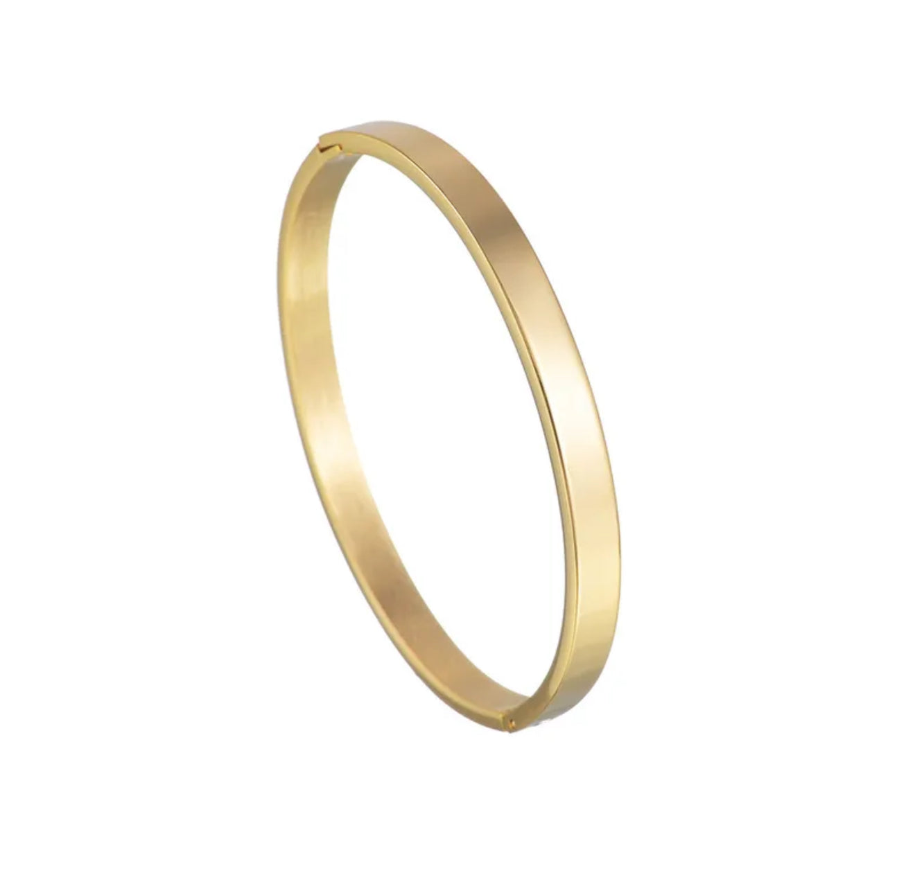 Gold plain bangle bracelet on a white background