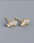 Gold earrings with clear gemstones 