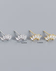 two pairs of gold and silver sparkle stud earrings with measurements indicated.