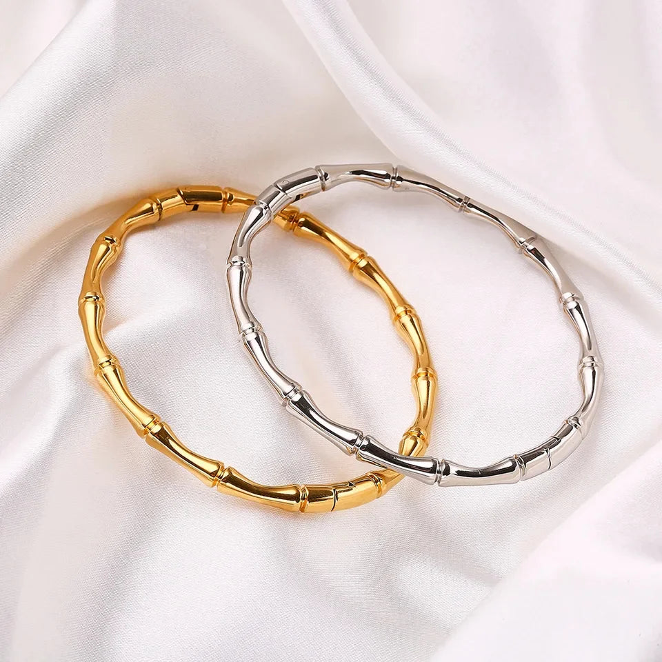 silver and gold Bamboo bangles with hinged openings