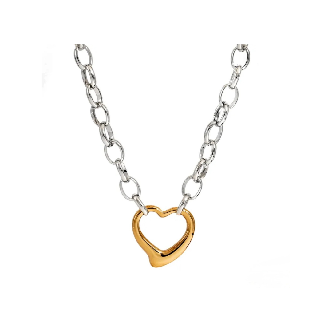 Necklace with a gold heart pendant on a silver chain against a white background