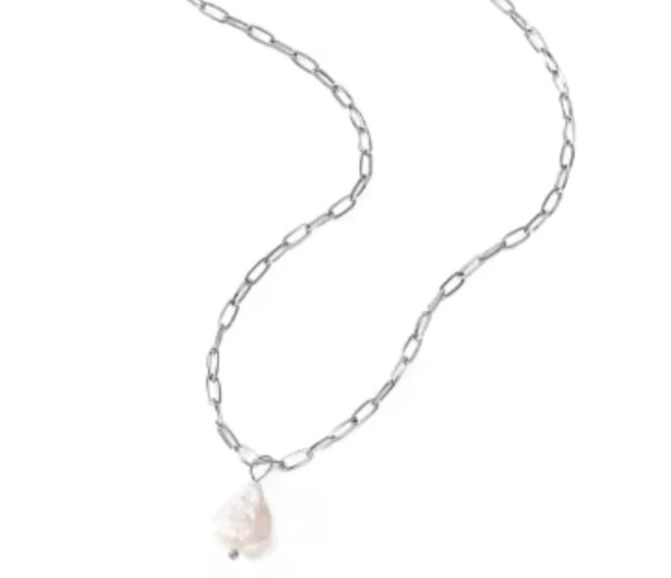 A silver chain necklace with a single baroque fresh water pearl pendant.