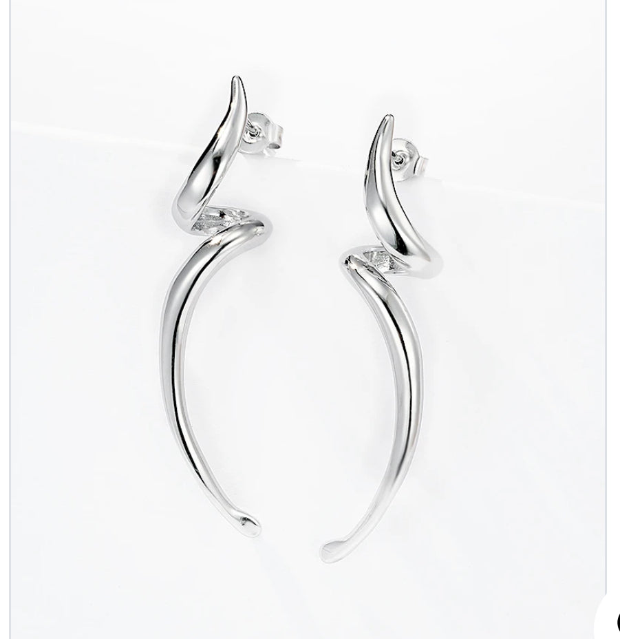 Pair of silver twisted bolt drop earrings on a white background