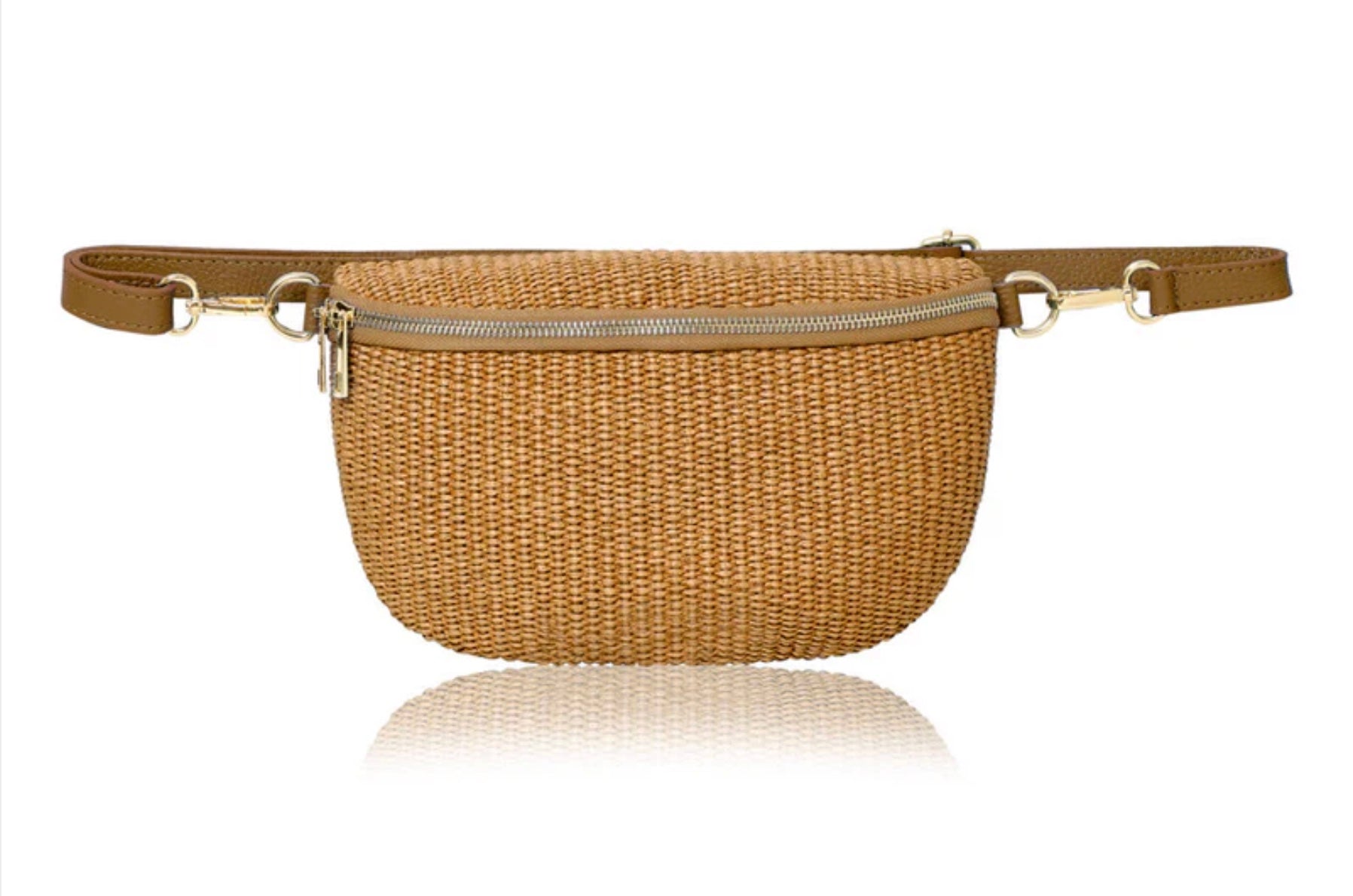 Tan raffia crossbody handbag with a gold accented zipper on a white background.