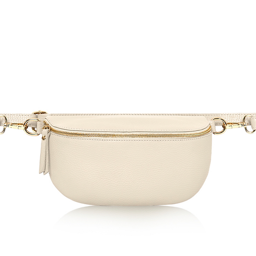 large cream crossbody/ waist bag with an adjustable strap ad gold hardware. 
