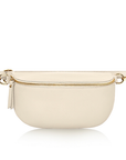large cream crossbody/ waist bag with an adjustable strap ad gold hardware. 