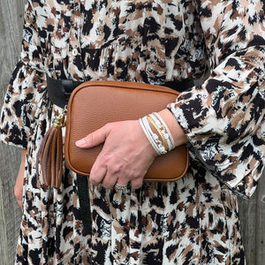 Tan tassel bag sales